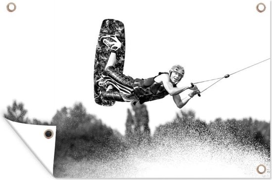 Décoration de jardin Une jeune wakeboardeuse vole au-dessus de ses éclaboussures – noir et blanc – 60×40 cm – Affiche de jardin – Toile de jardin